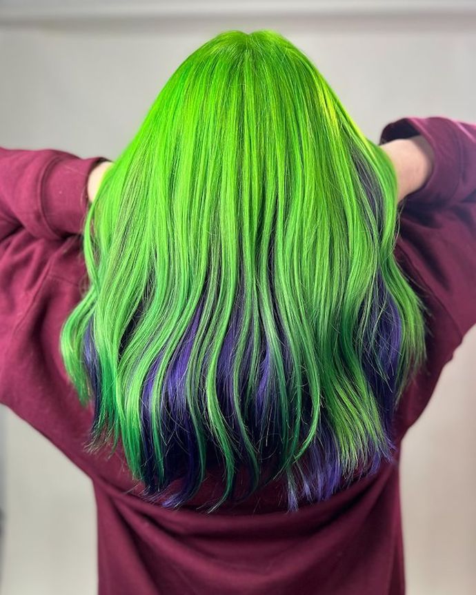 Halloween hair inspired look with green and violet hair under