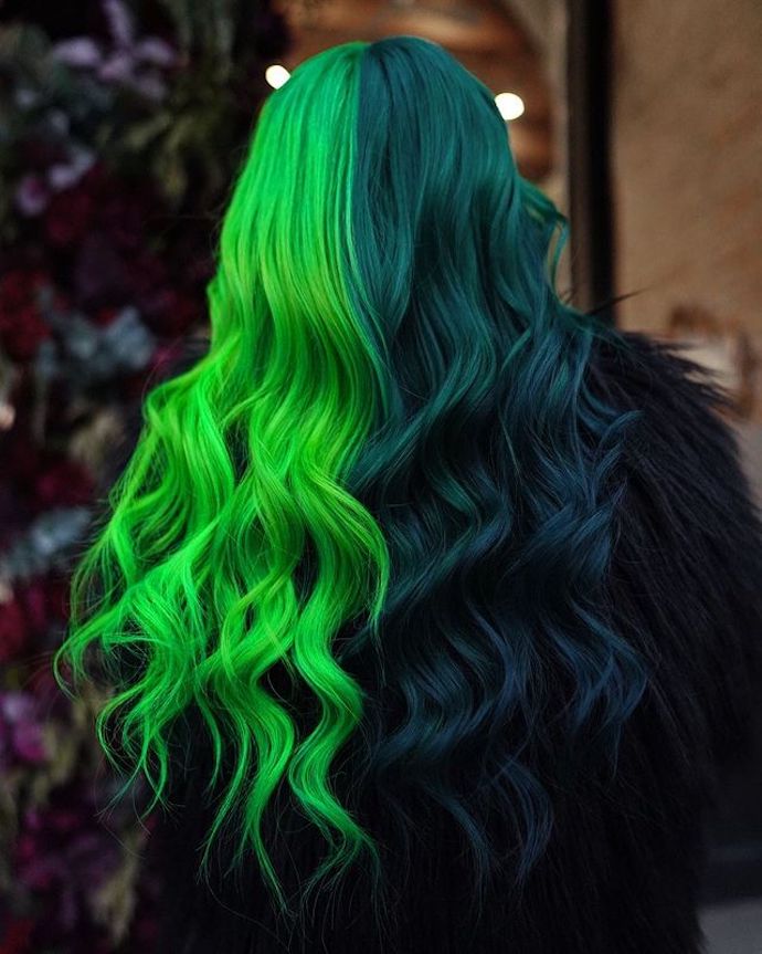Woman with mini raccoon tails with pops of red and black
