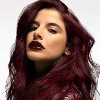 Woman with PRAVANA 6RV Red Violet Dark Blonde Hair Color