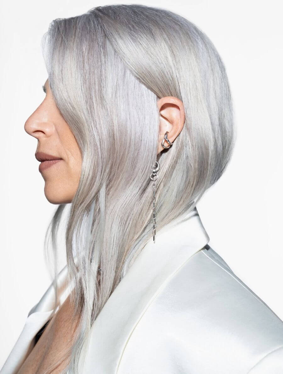 Silver-gray hair showcasing dimensional gray tones and a glossy, polished finish.